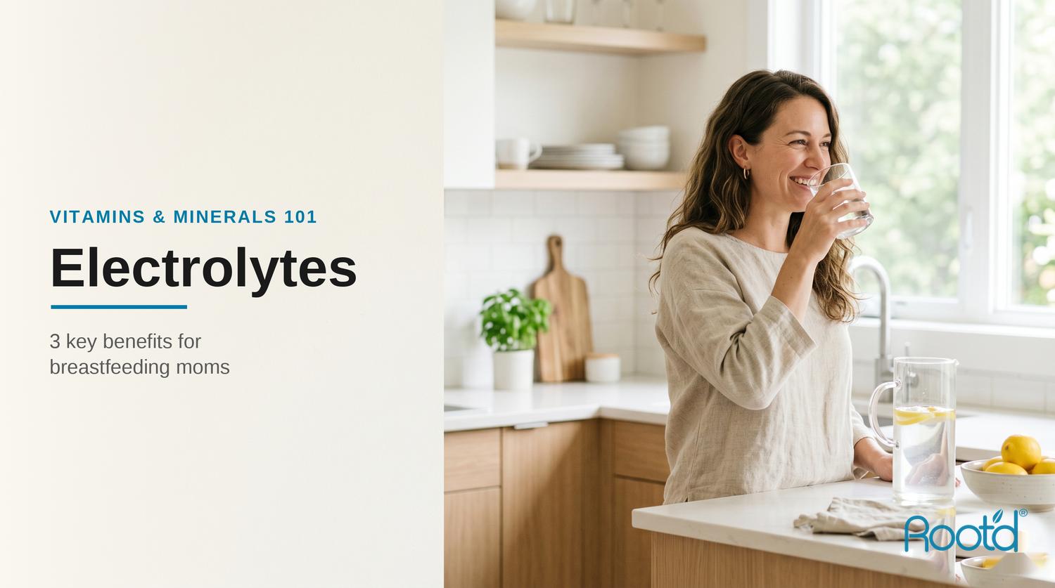 Smiling new mom drinking water in a bright modern kitchen — electrolytes for breastfeeding moms